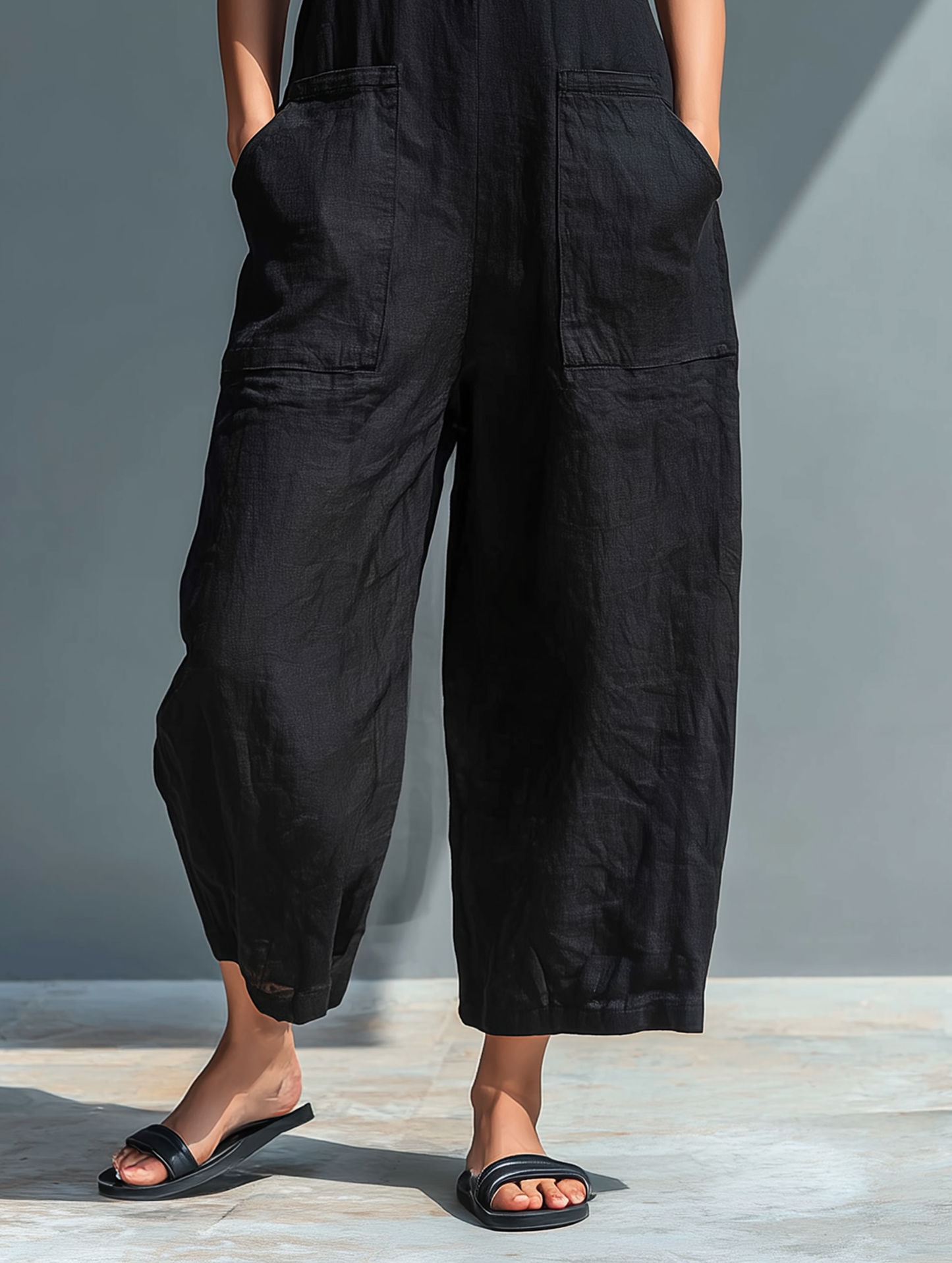 Minimalistischer ärmelloser Damen-Jumpsuit aus Leinenmischung mit Stehkragen und Knopfleiste